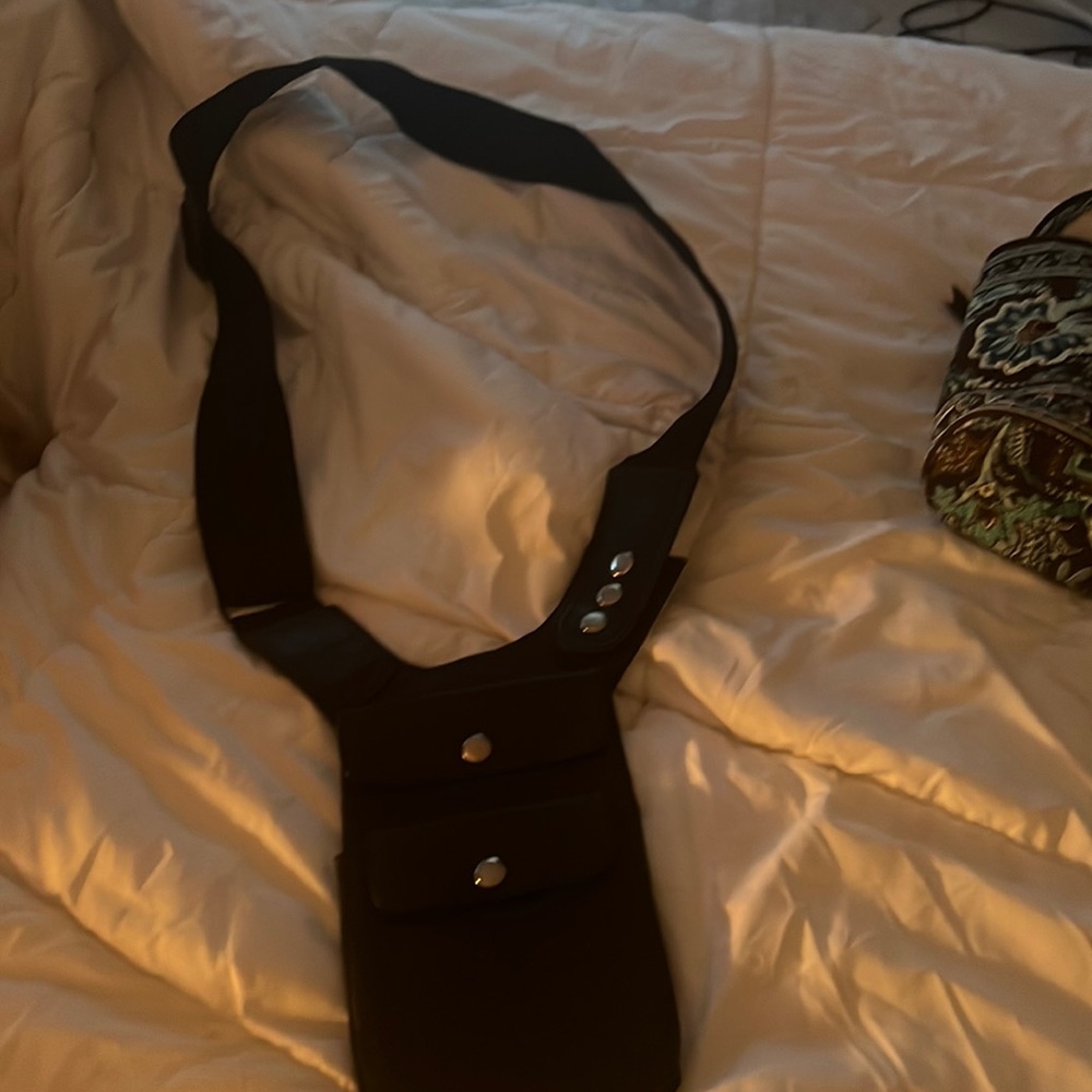 Leather shoulder bag great for the motorcycle or bicycle